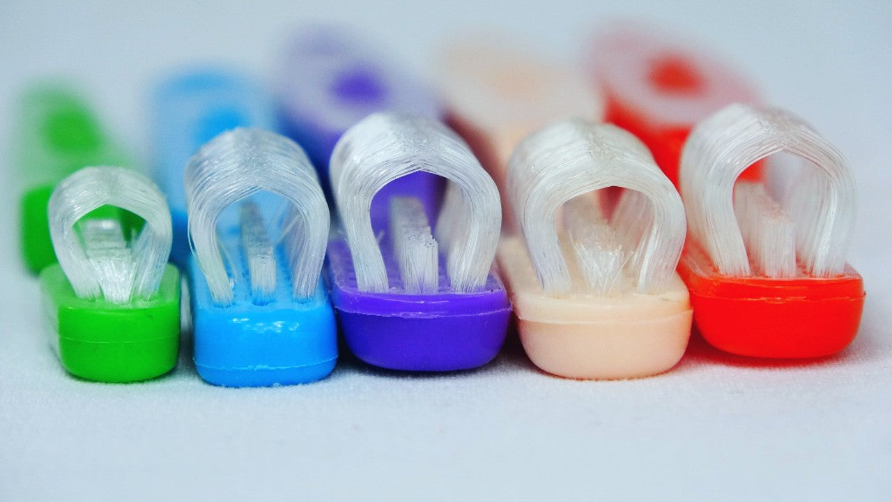 The Collis-Curve Toothbrush